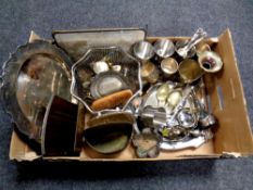 A box containing a quantity of metal wares to include a brass embossed letter rack, plated trays,