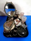 A tray containing assorted metal wares to include ornate brass dressing table mirror, napkin rings,