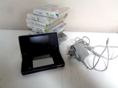 A Nintendo DS together with nine games (7 boxed)