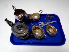 A tray containing antique plated wares to include three piece tea service, pair of grape scissors,