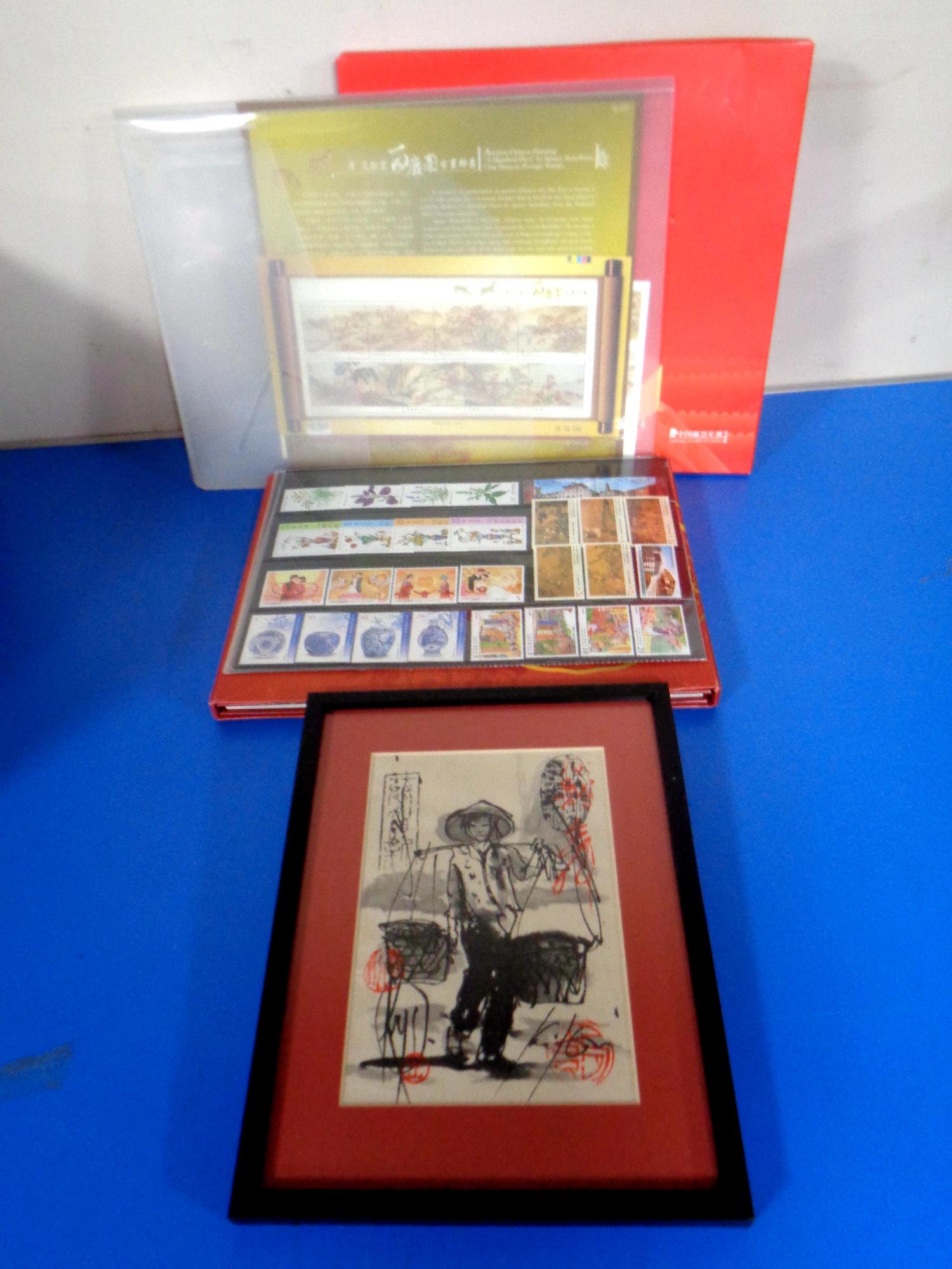 A collection of Chinese stamps to include the 2004 stamp year book, 2017 postage stamps of China,