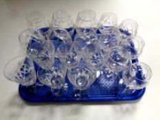 A tray containing lead crystal drinking glasses to include two sets of six Brierley Crystal brandy