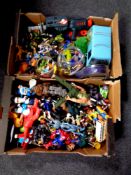 Two boxes containing a large quantity of assorted toys,