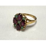 A 9ct gold ruby and emerald dress ring