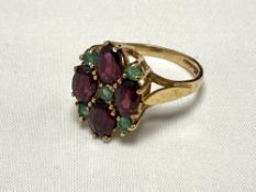 A 9ct gold ruby and emerald dress ring