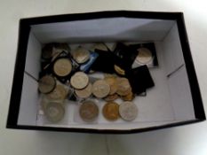 A box containing a quantity of assorted crowns