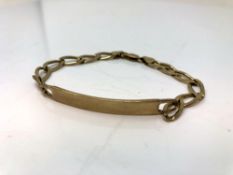 A 9ct gold identity bracelet. CONDITION REPORT: 12.