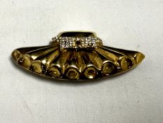 A gold plated on silver bow brooch