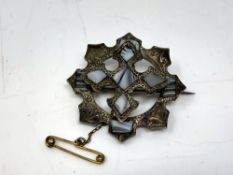 An antique silver and hardstone brooch