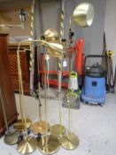 Seven assorted brass floor lamps (continental wiring)