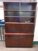 A mid 20th century bureau bookcase fitted cupboards and drawers beneath