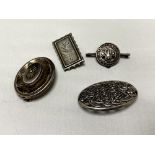 Four vintage silver brooches