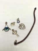 A small quantity of jewellery including silver pendants,