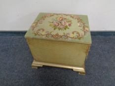A pine tapestry upholstered storage footstool
