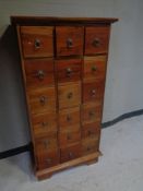 An eastern hardwood 18 drawer chest CONDITION REPORT: 68cm wide by 44cm deep by