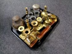 A tray of antique and later metalware, brass candlesticks,