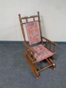 An Edwardian child's American style rocking chair