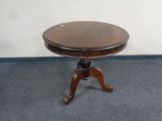 A Victorian style pedestal occasional table