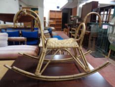 A bamboo and wicker rocking horse