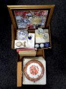 Two boxes containing assorted collector's plates together with collector's plate book,