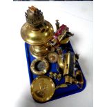 A tray of antique and later brass wares to include Duplex oil lamp, Burmos blow lamp, ash tray,