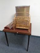 A folding baize topped card table together with a bamboo and wicker magazine rack,