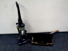 A Samsung upright vacuum together with a box containing Bush LCD TV, bathroom scales,