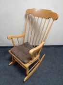 A spindle back rocking chair