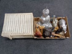 A box containing ornaments to include Buddha figures, tambourines, wooden pipes,