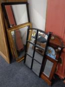 A 19th century mahogany mirror and glass panel, framed as one,