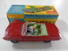 A Corgi Toys 246 Chrysler Imperial with figures in original box