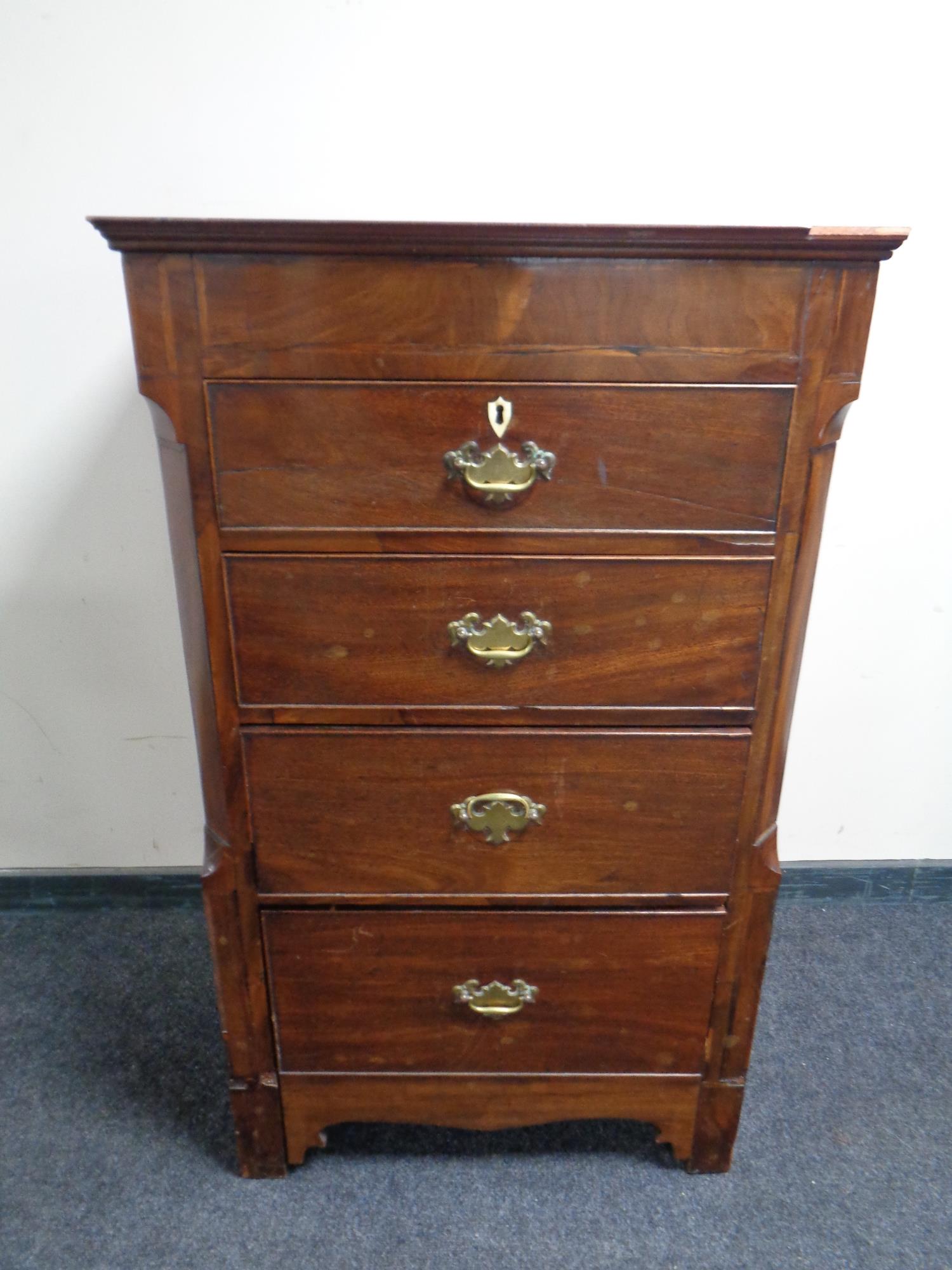 A 19th century mahogany four drawer chest with brass drop handles