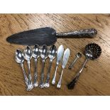 A quantity of silver cutlery including straining spoon, set of five teaspoons etc.