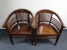 A pair of stained beech bentwood armchairs