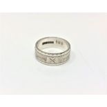 An 18ct white gold band ring, 6.2g, size M.