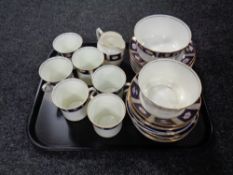 A tray of thirty-one pieces of antique Windsor tea china