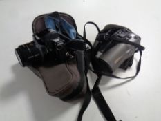 A Chinon CP-9 AF camera with lens in bag,