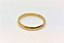 An Eastern yellow gold band ring, 3.7g, size W.