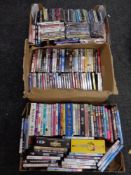 Four boxes containing various DVDs to include children's
