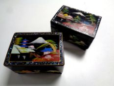 Two 20th century oriental lacquered musical jewellery boxes