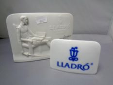 A Lladro Collector's Society plaque and a further Lladro plaque