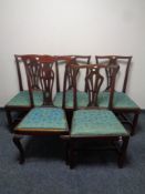 A set of four antique Chippendale style dining chairs together with one other similar chair