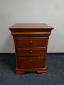 An Olympus Furniture cherry wood three drawer chest