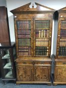 A reproduction burr elm double door bookcase fitted slide,