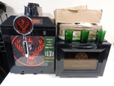 A Jagermeister machine and mini fridge together with a quantity of Jagermeister shot glasses