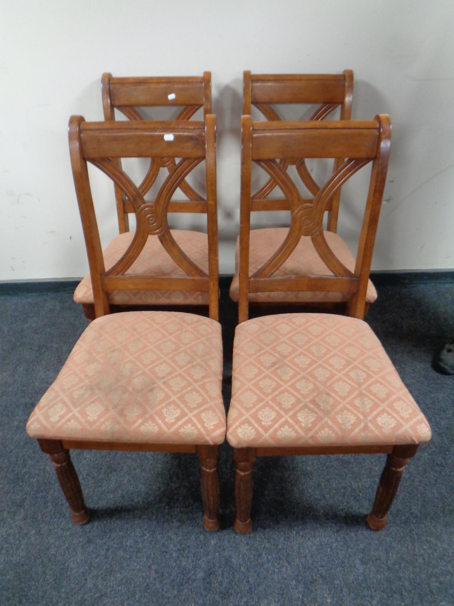 A set of four American style dining chairs