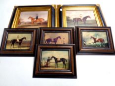 A box containing six crackle glazed panels depicting horses and jockeys,