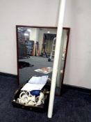 A mahogany framed wall mirror, box of curtain pole and curtain rings,