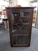 A 19th century hanging corner display cabinet