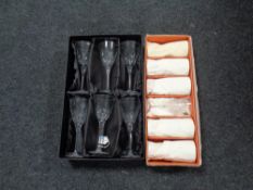 A boxed set of six Thomas Webb crystal wine glasses together with a further set of six crystal